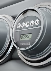 Gray electric meters standing in a row